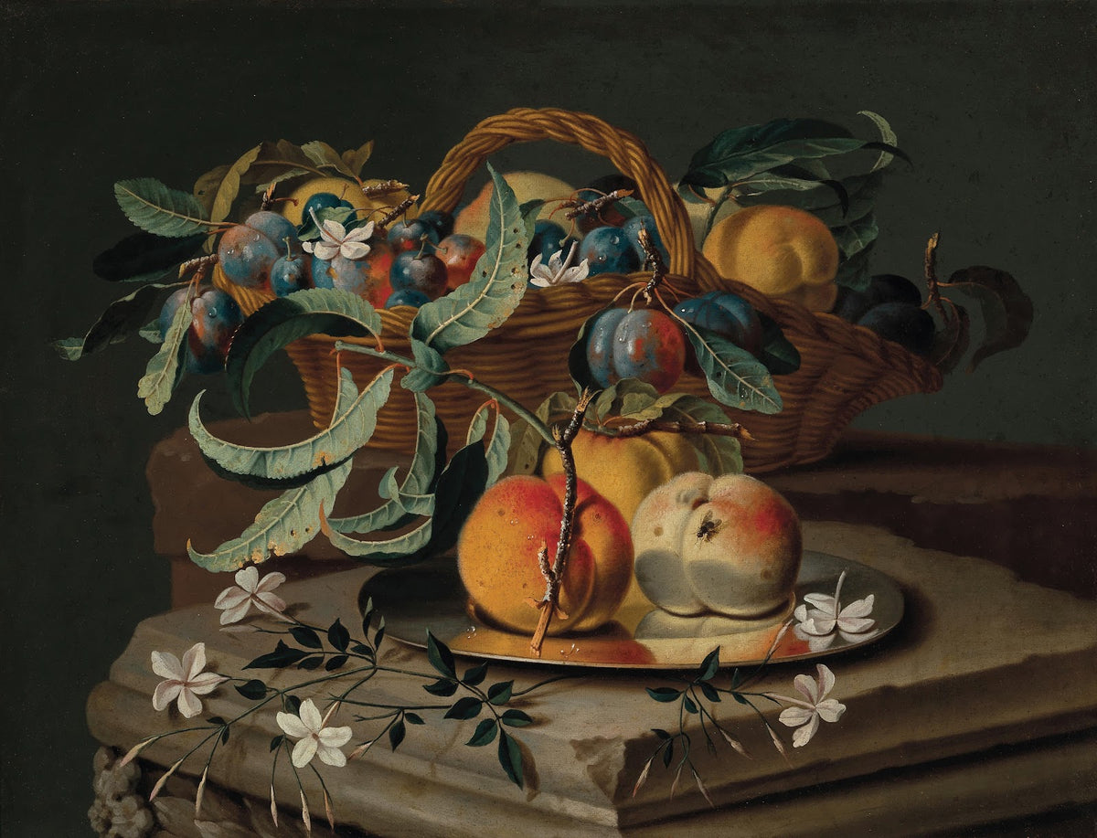 Peaches and plums in a basket and on a pewter plate with flowers on a stone plin