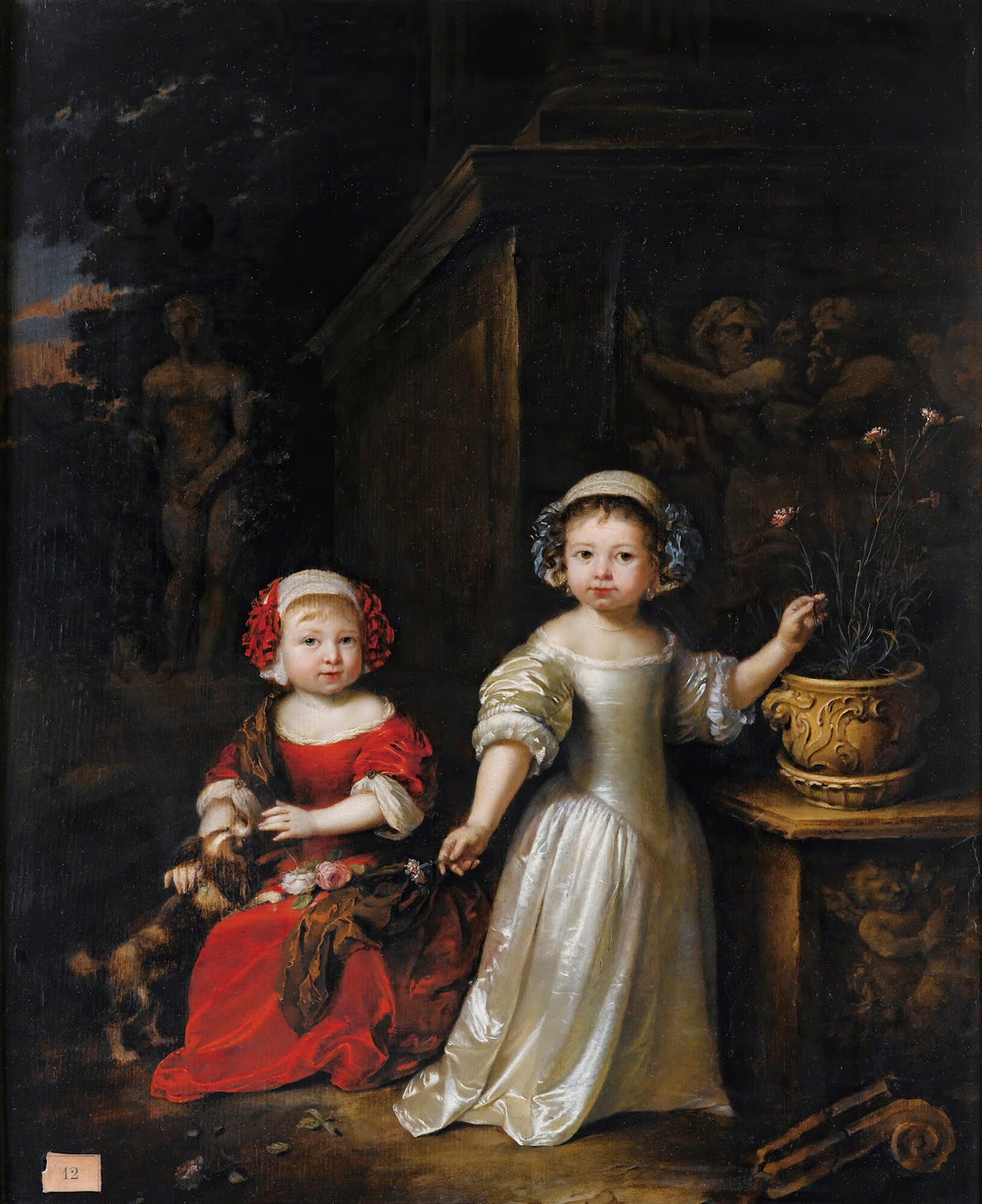 Portrait of TwoYoung GirlsIn a Park OnePlaying WithA Dog The OtherHolding a Carn