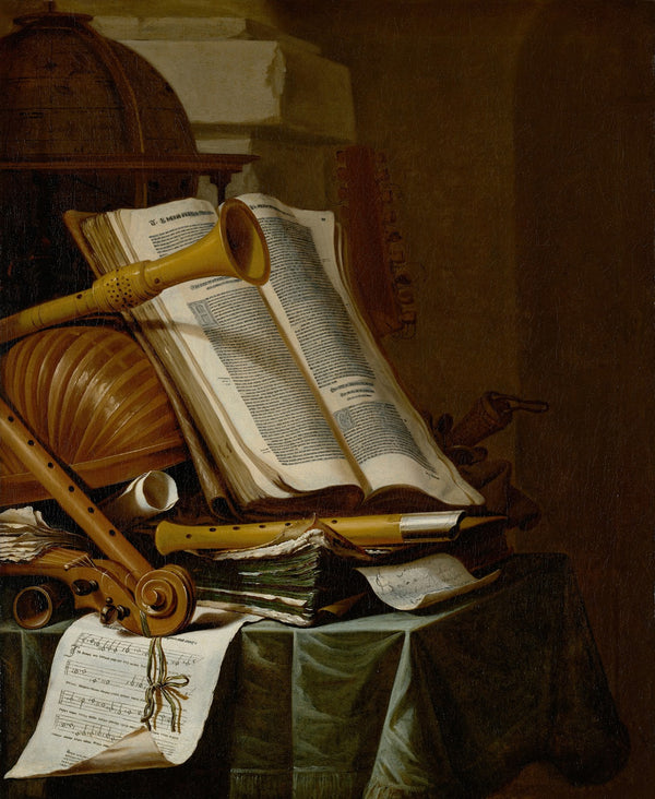 Books a globe and musical instruments on a draped table