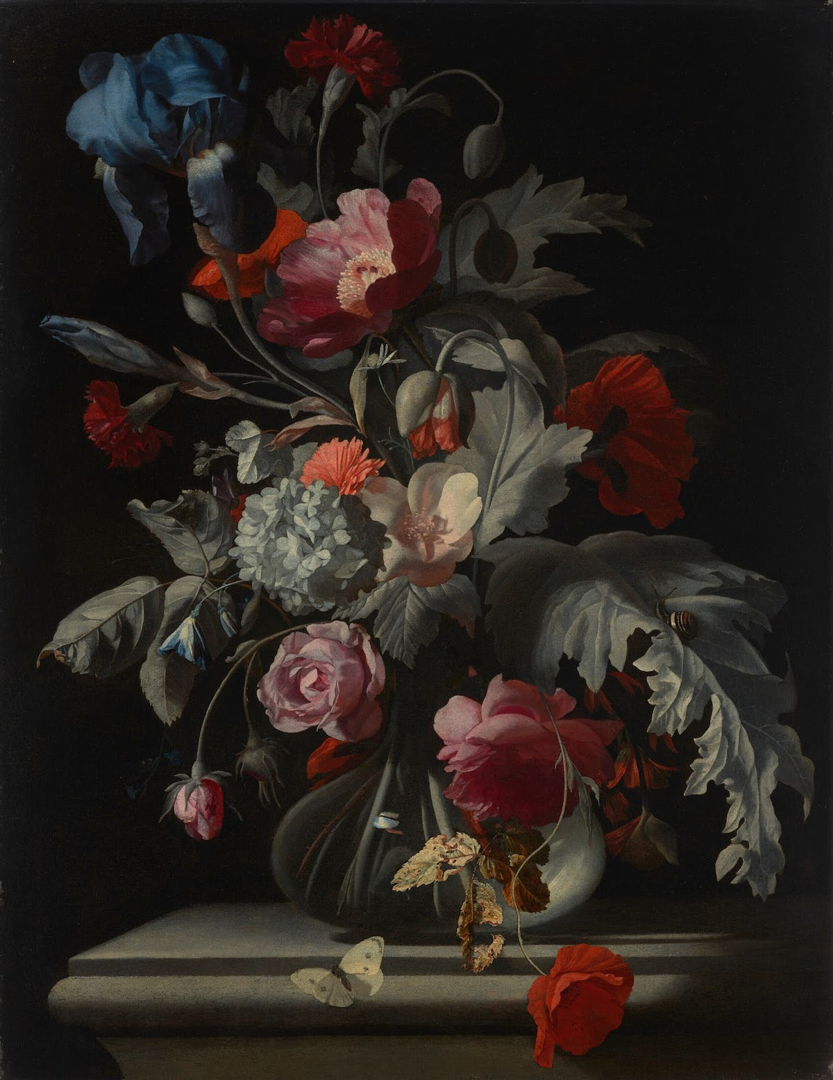 Roses carnations poppies and hydrangea and an iris in glass vase with a snail an