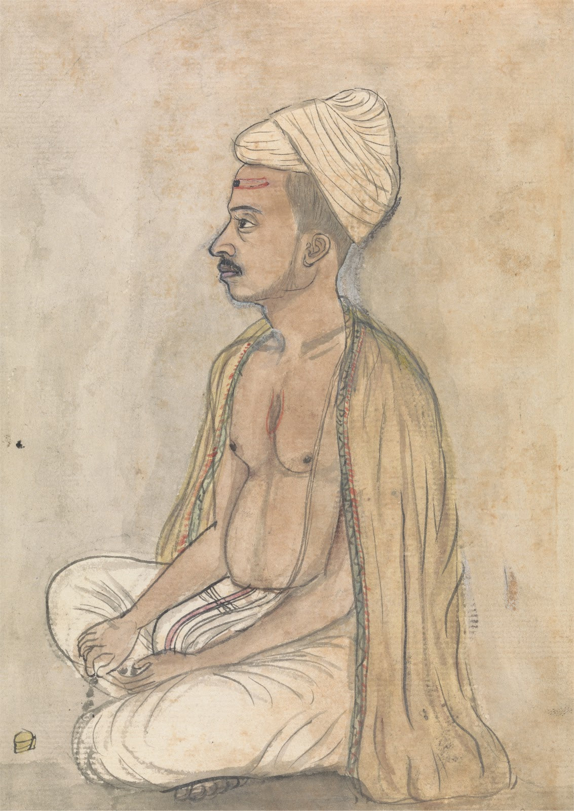 Man with a Yellow Shawl Sitting Crosslegged