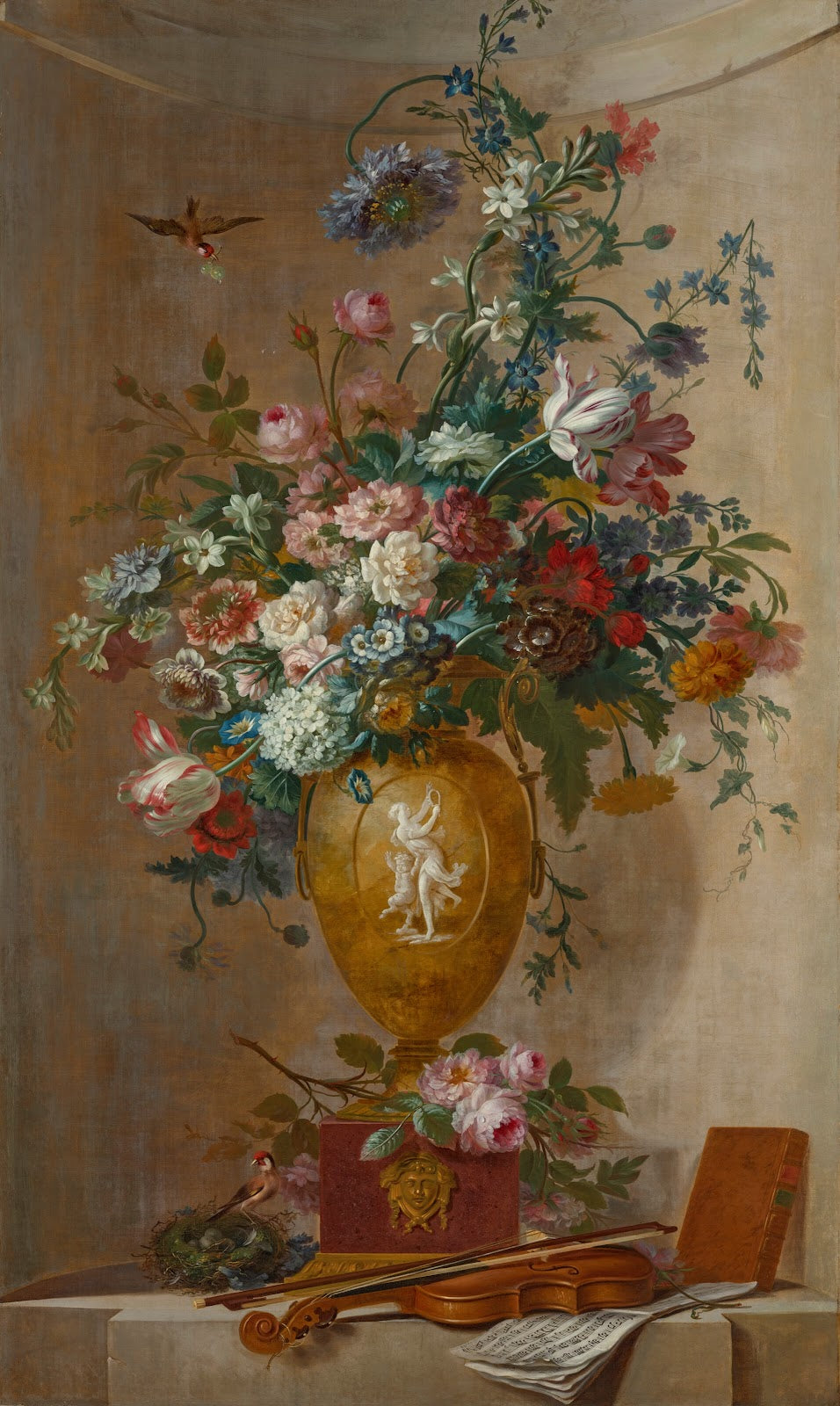 Tulips roses narcissi morning glory and other flowers in a sculpted vase with a