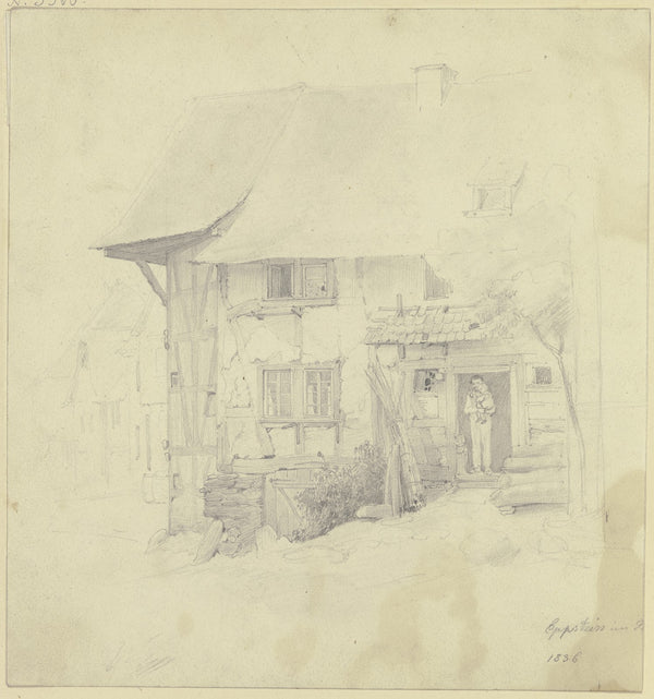 Bauernhaus in Eppstein unter der Haustür steht ein Mann mit einem Kind auf dem A