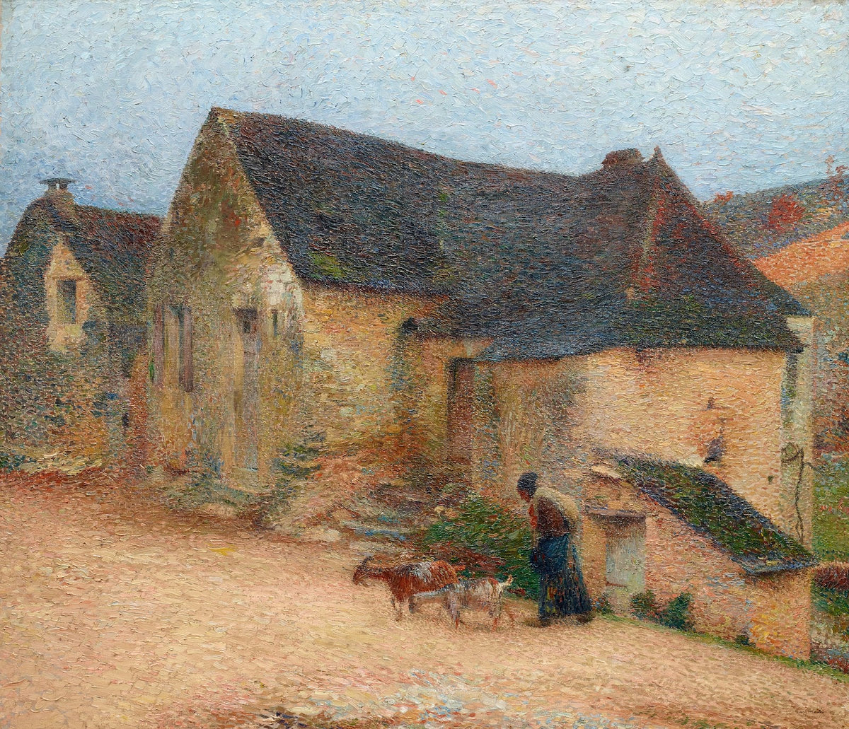 Chevrière devant une vieille maison à Labastide